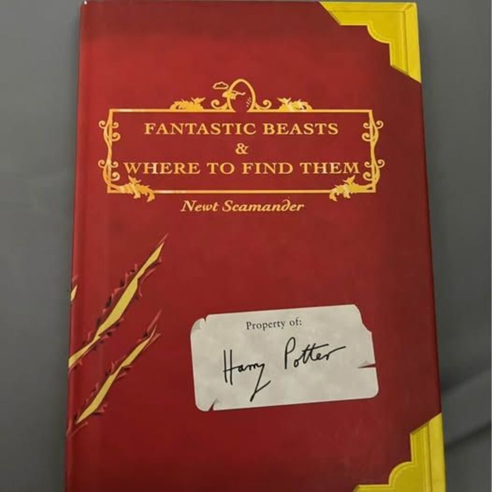 Fantastic Beasts & Where to Find Them by Newt Scamander (J.K. Rowling)